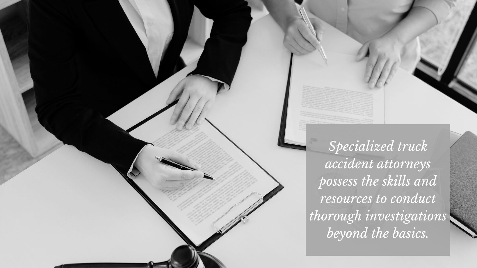 How Are Truck Accidents Different from Car Accidents? A Personal Injury Attorney Explains 1 attorneys discussing a truck accident